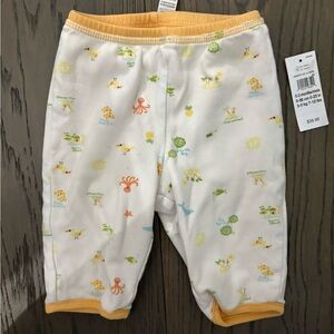 Baby gap yellow baby reversible pants 0-3M NWT ret $45w tx